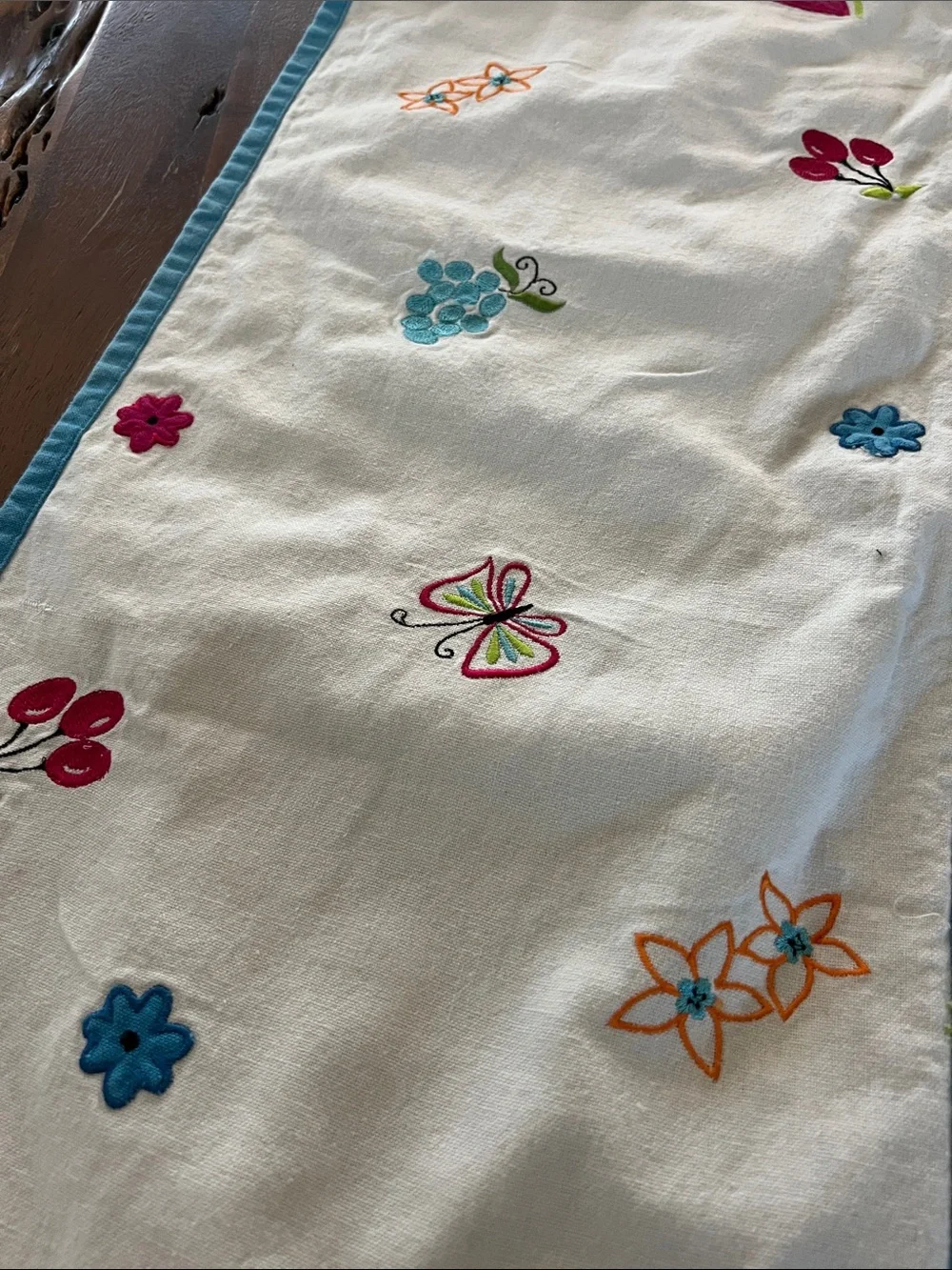 White Embroidered Floral Table Runner with Blue Trim
